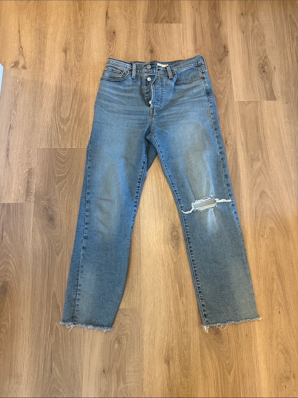 High-Rise Straight Leg Jeans in Light Blue with Distressed Knee